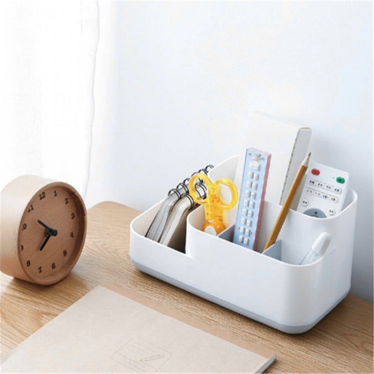 White plastic desk organizer caddy with divided slots for stationery and beauty tools