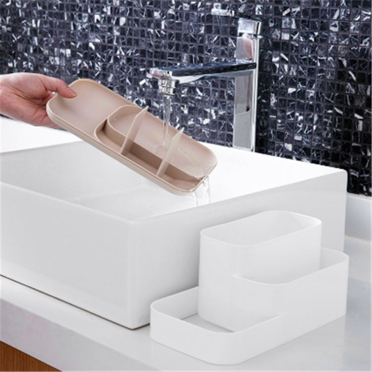 White plastic cosmetics organizer with detachable compartment top and stacked base