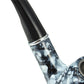 Metal smoking pipe close-up of black stem and marble-pattern bowl junction