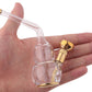 Mini acrylic hookah held in hand, clear chamber and copper-toned valve