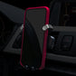 Car air vent phone holder with red frame holding a smartphone