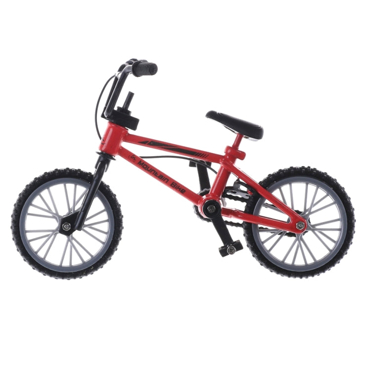Red mini kids finger bike toy, side view with black seat and front fork