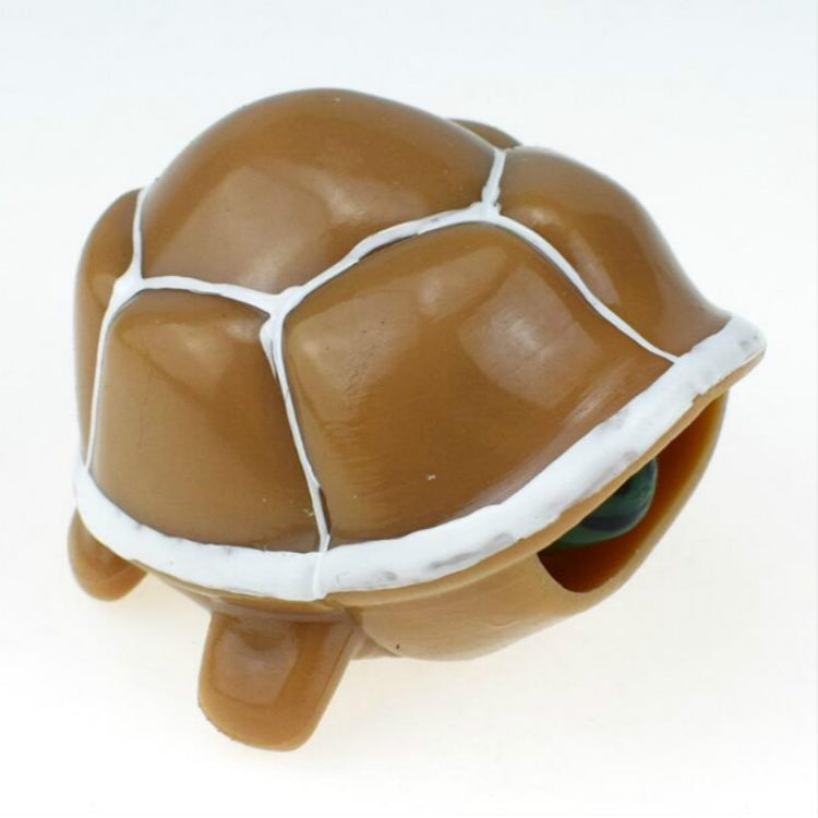 Telescopic turtle squeeze toy with brown shell and white trim, feet visible