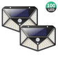 Set of two outdoor solar wall lights with black housings, LED panels, and motion sensor