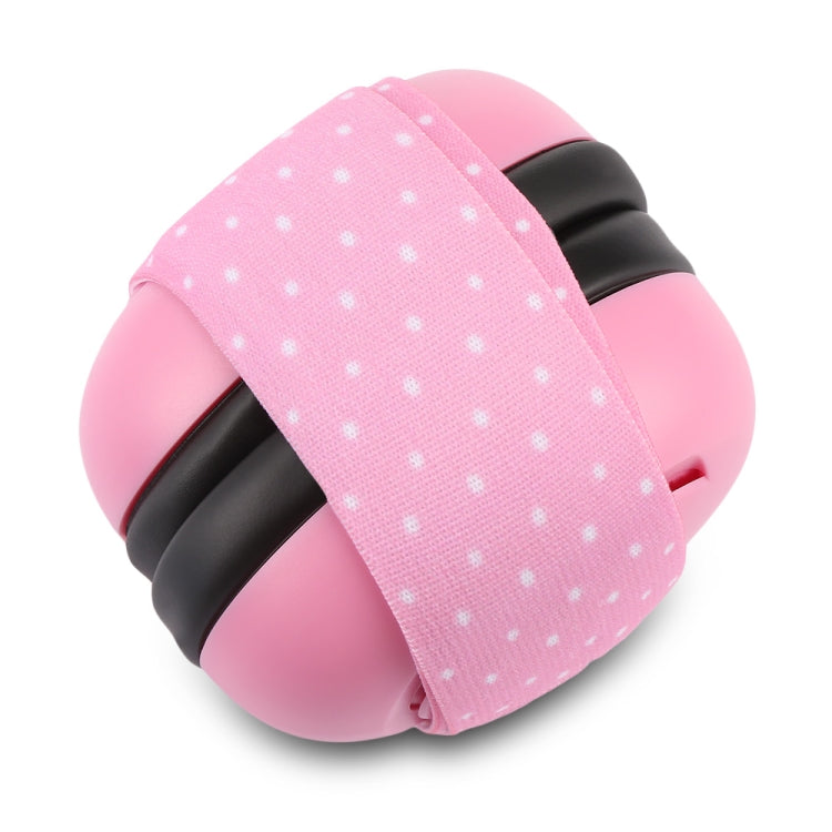 Pink baby earmuffs with black ear cups and white polka-dot fabric headband