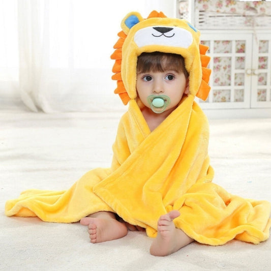 Yellow hooded bath towel cape with lion face hood and baby wrapped in towel