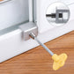 Anti-theft door/window stopper kit showing metal bracket and yellow key on window frame