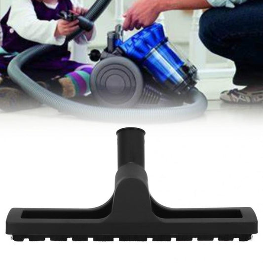 Black vacuum cleaner floor brush head with bristle strip and wide cleaning mouth