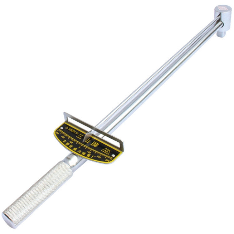 Torque wrench with textured white grip and black-yellow dial scale on the handle