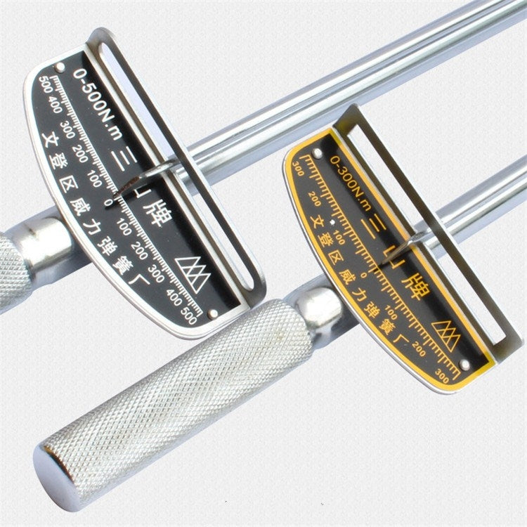 Torque wrench heads with black and yellow dials marked for 0–300 N·m and 0–500 N·m