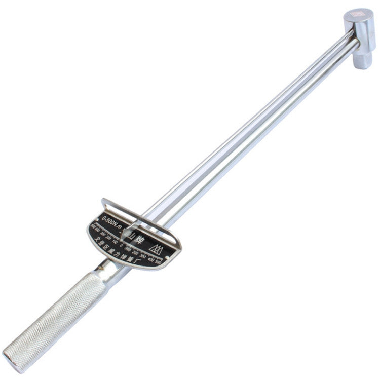 Torque wrench with white textured grip and black-yellow scale plate on the handle