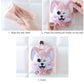 Pink cartoon dog wall toothbrush holder installation on a white tiled wall.