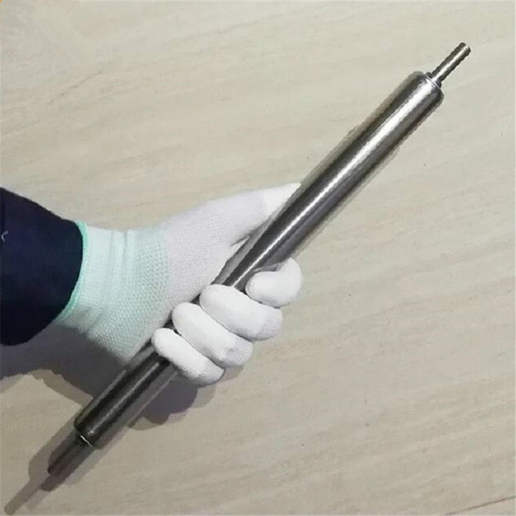 Automatic continuous mousetrap held in white-gloved hand, silver cylindrical body