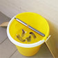 Automatic continuous mousetrap set in a yellow bucket with bait on the trigger rod