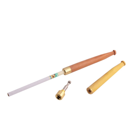 Light wood cigarette holder with gold-tone base ring, plus filter insert pieces.