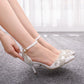 White rhinestone pointed-toe stiletto heels with ankle strap and embellished bow