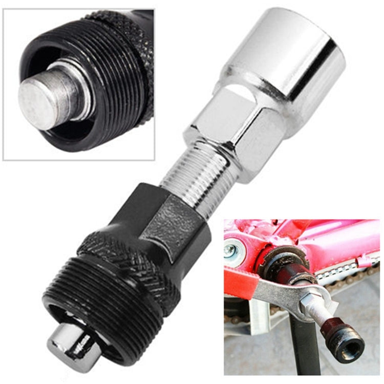 Bicycle crank remover tool with metal socket, threaded shaft, and black grip