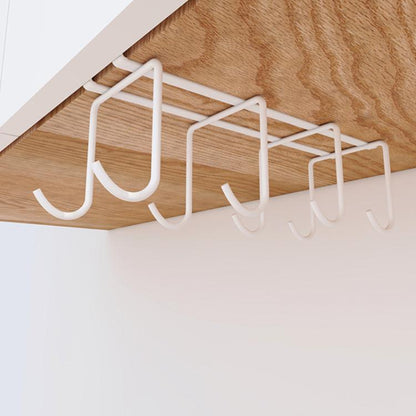 White hanging cup holder rack with eight curved hooks for kitchen cups and mugs