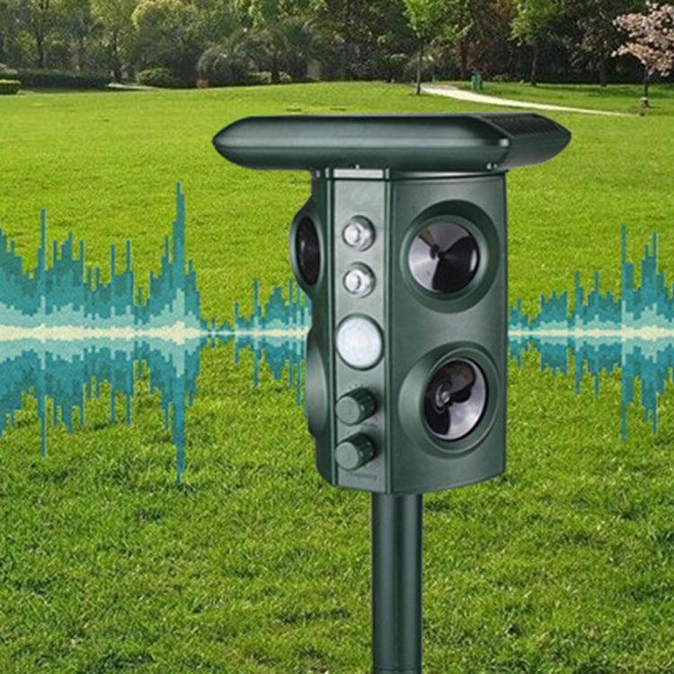 Green solar ultrasonic animal repeller with two speaker openings and central control panel