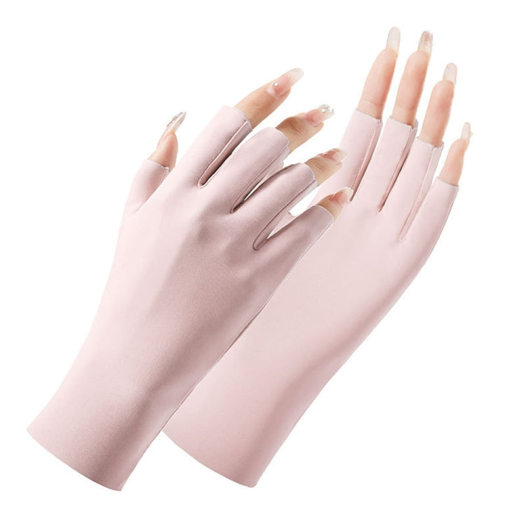 Pink half-finger sunscreen gloves with open fingers, two hands wearing