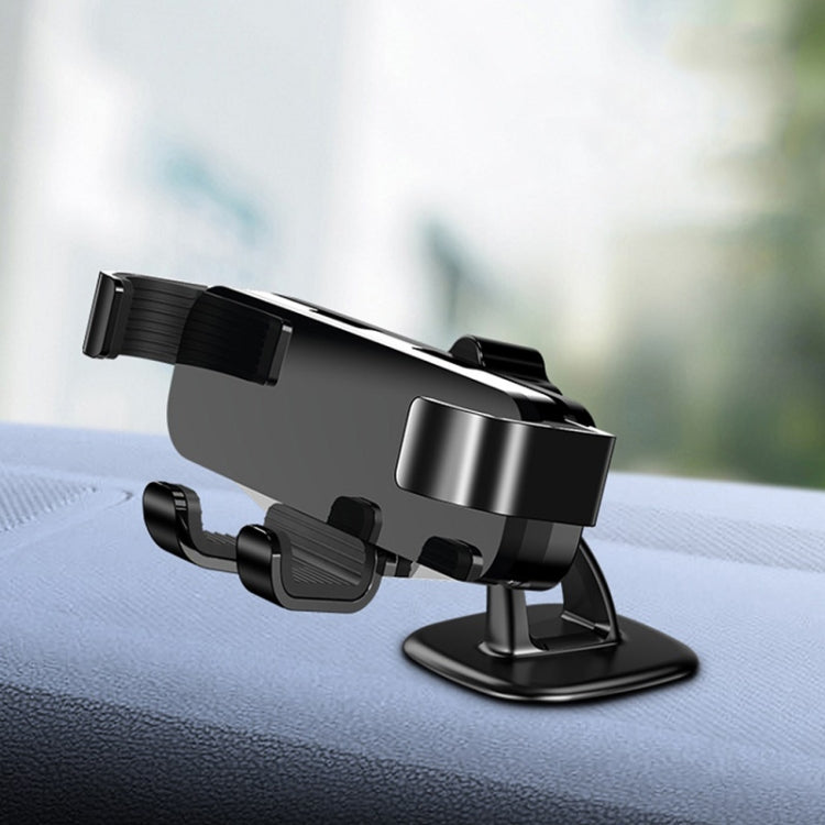 Black gravity phone holder with vent base and phone cradle on car dashboard