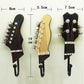 Three guitar-shaped wall hooks with headstock details; wall hook length 19 cm