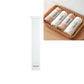 White self-adhesive roll strap with fastening clip, displayed upright