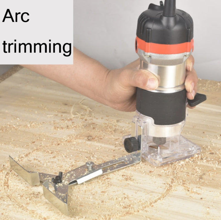 Handheld electric trimming router with clear base and rotating chuck for wood