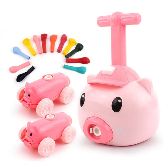 Pink pig-shaped balloon car toy with small pig cars and colorful accessory parts
