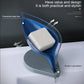 Transparent blue leaf soap box with white bar and suction-cup bottom
