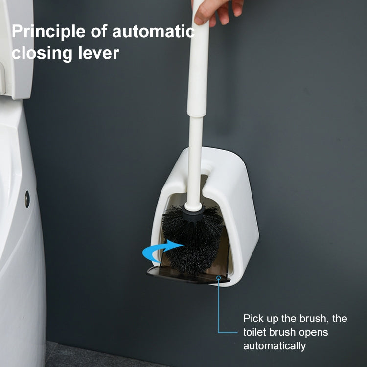 Wall-mounted toilet brush showing automatic opening and bristle insertion area