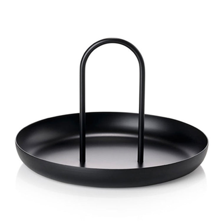 Black round storage tray with two upright curved handles for small desk items.