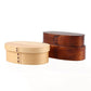 Stacked wooden lunch box set with two compartments in light and dark wood tones