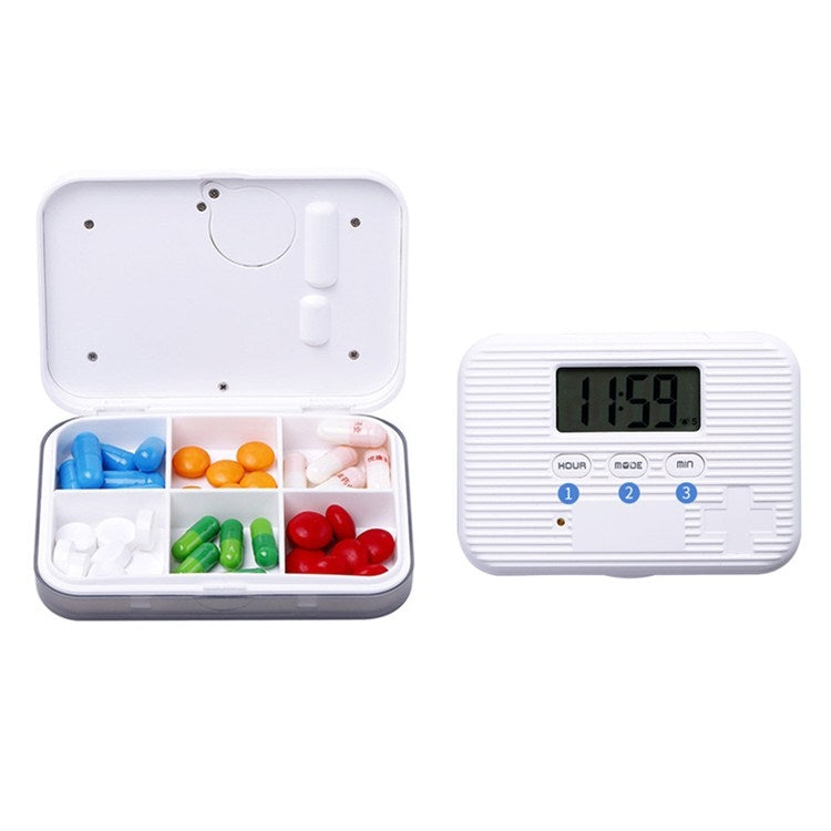 Mini electronic 6-compartment pill box, open tray with capsules and closed display unit