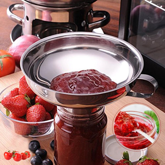 Stainless steel funnel pouring ingredients into a container jar