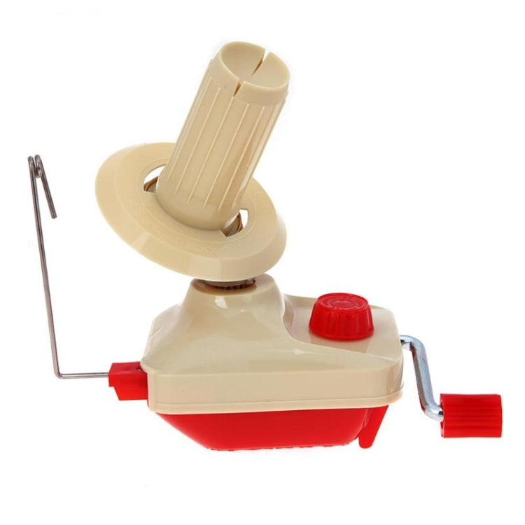 Yarn winding tool with beige circular spool support, red housing base, and metal rod