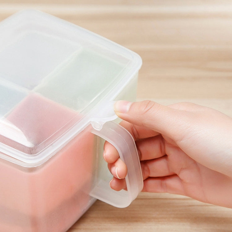 Hand holding a lid on a three-compartment pastel kitchen container with spoon