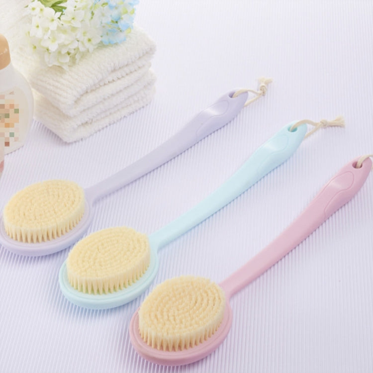 Two round bath scrub brushes with yellow heads on pink and blue long handles