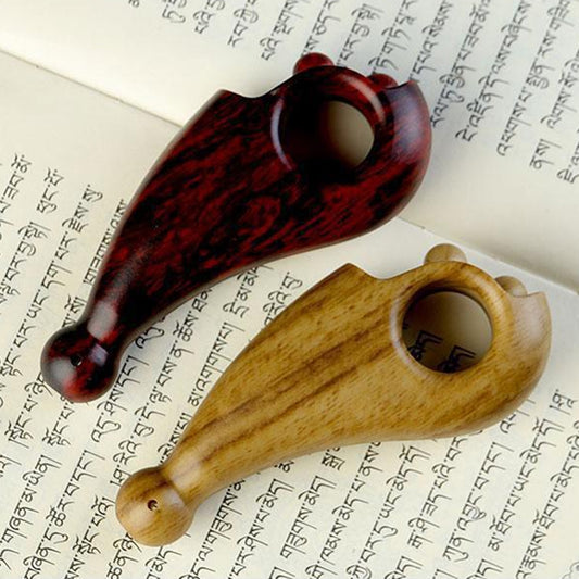 Wooden rolling bead counters in dark and light tones with finger grip openings