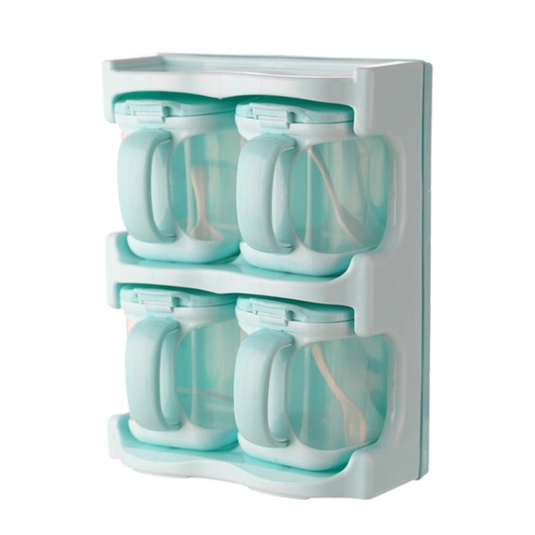 Teal plastic seasoning organizer with 4 hinged compartments (2 grids)