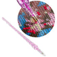 Purple glitter diamond painting pen with pointed tip over numbered canvas
