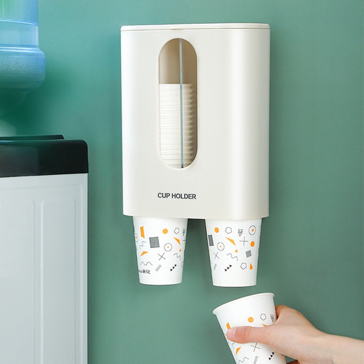 Wall-mounted disposable cup dispenser, white unit with oval opening and two bottom slots