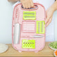 Folding plastic cutting board open with multiple blade attachments, pink and lime green