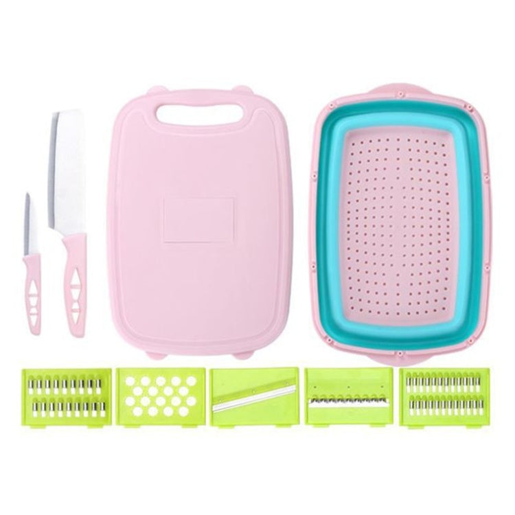 Folding plastic cutting board with snap handle and grater attachments, pink and teal
