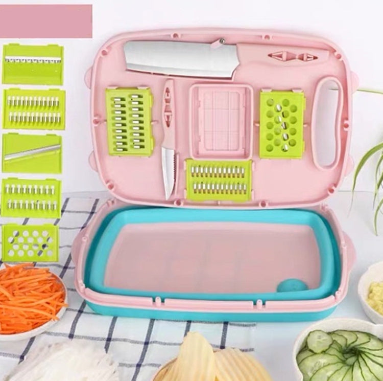 Folding plastic cutting board set in pink with teal base and colorful chopping inserts