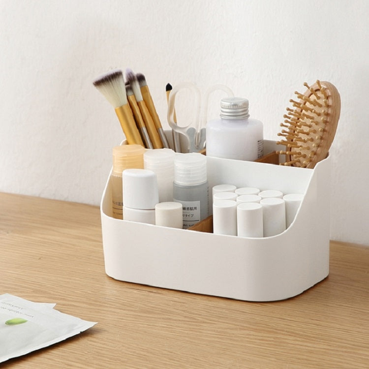 White plastic desk storage bin with divided compartments for toiletries and tools
