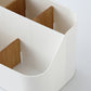White plastic multi-compartment storage box with curved open dividers