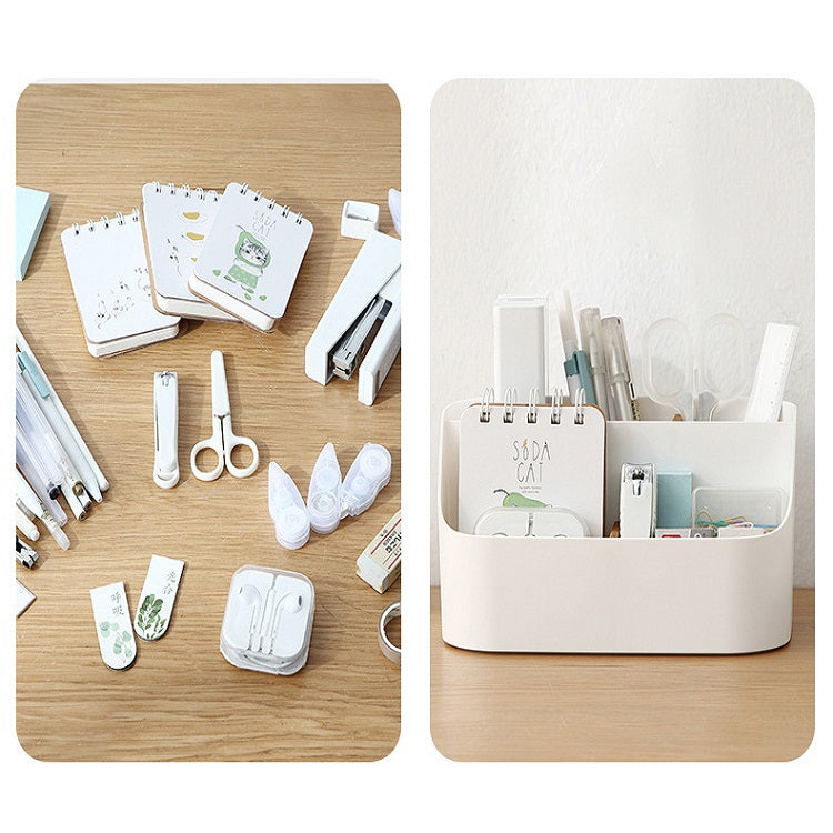 White plastic multi-compartment storage box holding stationery and small accessories