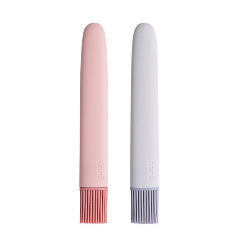 Silicone oil brush, two-piece design with pink and white handles