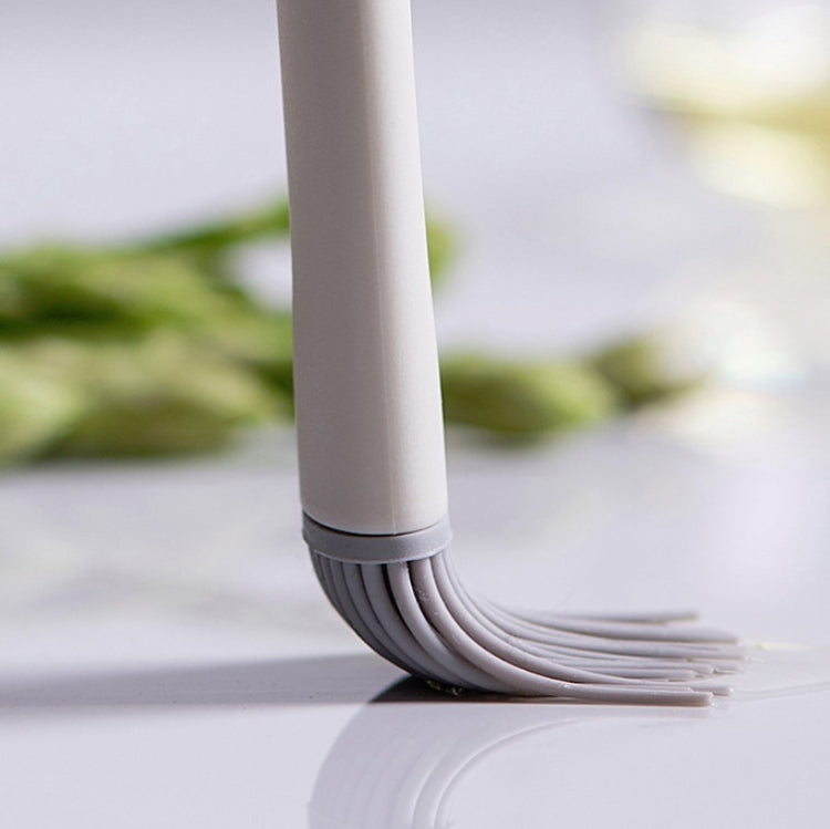 Gray silicone brush bristle head for spreading oil or sauce